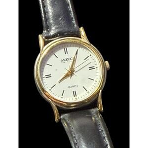 America Perry Ellis Women's Gold Tone Quartz Watch with Black Leather Strap